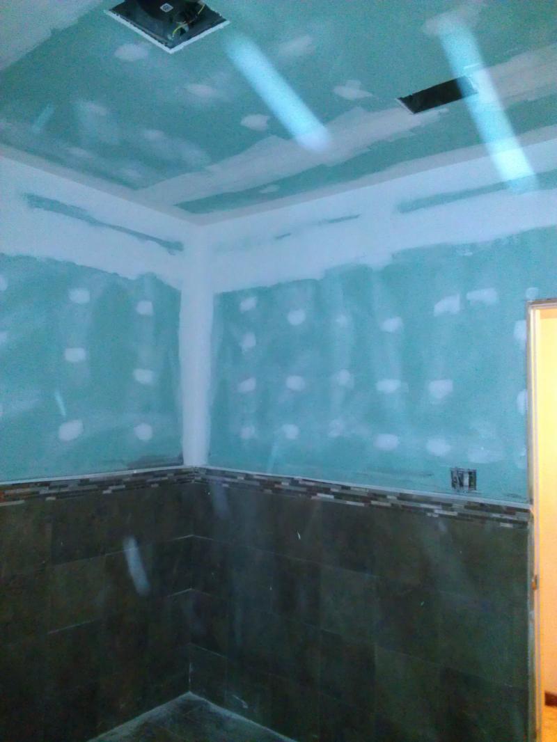 Taping and spackling after sheetrock install.Then comes priming and paint.